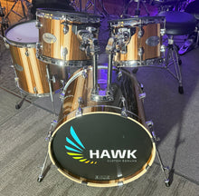 Load image into Gallery viewer, Drum set with Hawk logo on a carpeted floor
